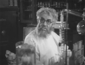 Captura de tela do filme Maniac (1934), em domínio público, mostrando Horace B. Carpenter como o personagem "Dr. Meirschultz". Captura de tela do filme Maniac (1934), em domínio público, mostrando Horace B. Carpenter como o personagem "Dr. Meirschultz".